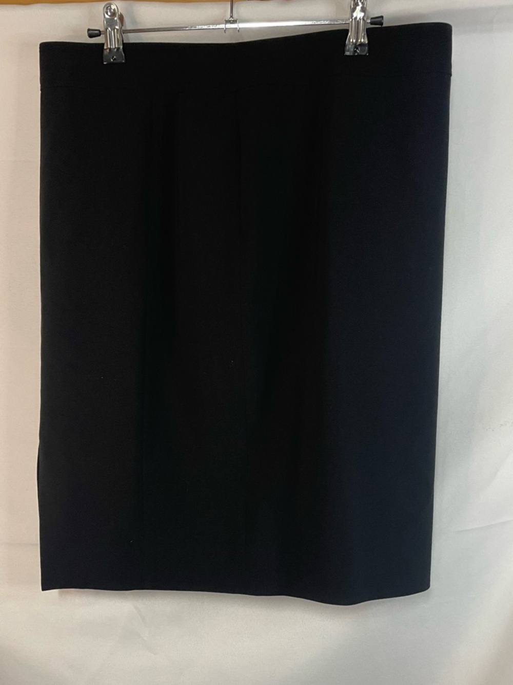 Tahari wool blend black pencil skirt. This is beautiful with a slit in the back.
